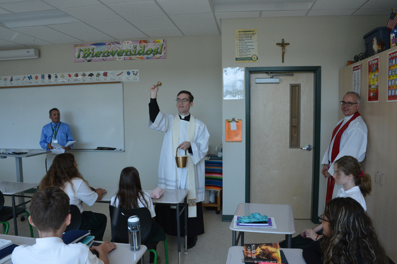 priest-blessing-new-ms-classroom