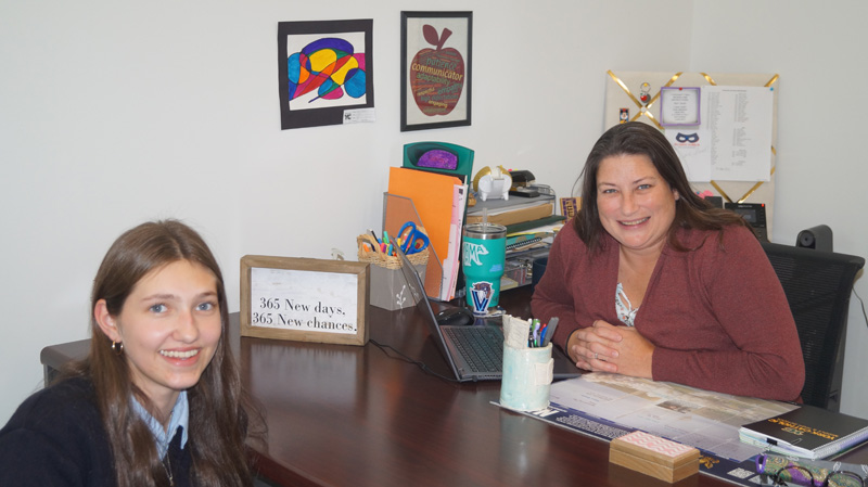 guidance counselor and student talking