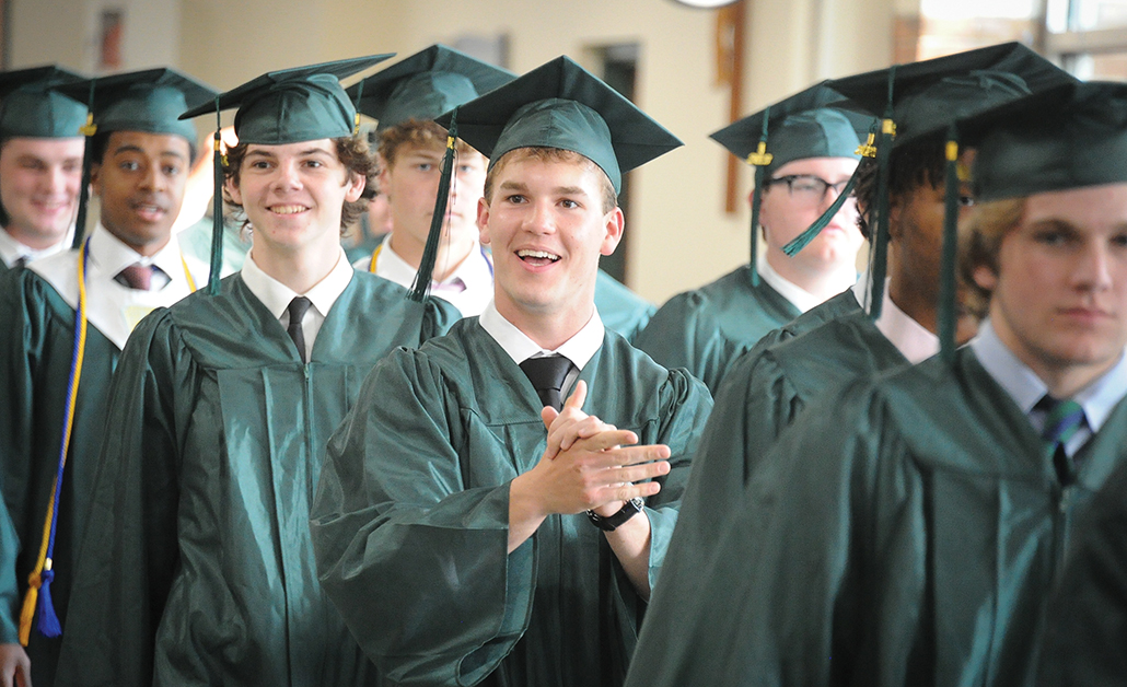York Catholic students in graduation caps and gowns