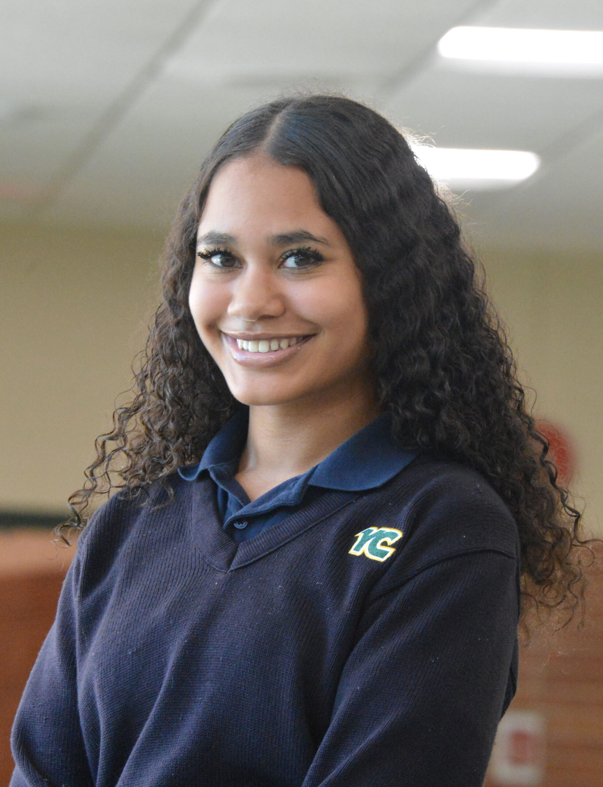 female student wearing blue uniform