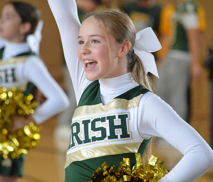 YC cheerleaders cheering during pep rally