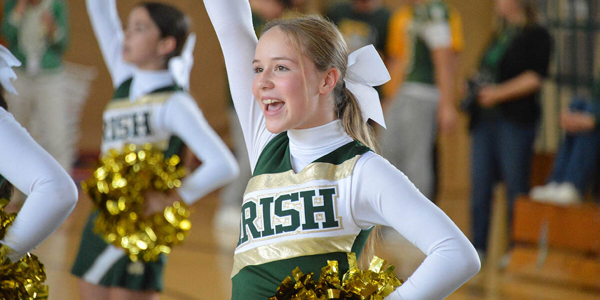 YC cheerleaders cheering during pep rally