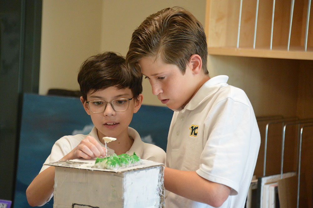two you YC students working together in classroom